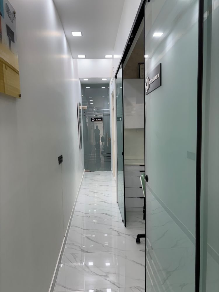 Glass-door corridor to Dr. Ankita's cabin and Operatory II